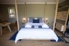 Zenkaya prefab living unit - interior bed Stilts plywood furniture 